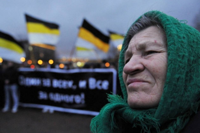 «Θερμή» συγκέντρωση για Πούτιν, ψυχρό κλίμα στη Μόσχα