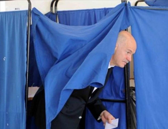 Εκλογές 2012: Οι πολιτικοί στις κάλπες μέσα από το φωτογραφικό φακό