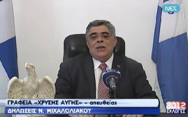 Στο πλευρό του  Μιχαλολιάκου ένας συμβολικός αετός