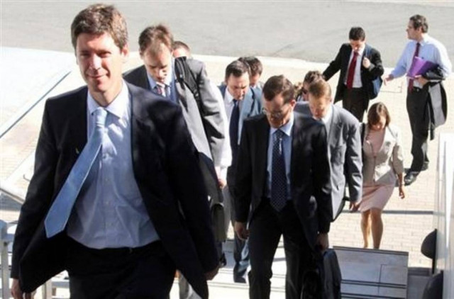 Διχασμένοι οι Κύπριοι για την τρόικα