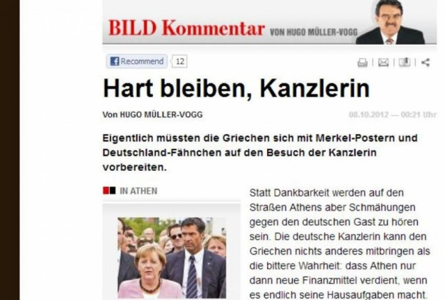 Bild: «Οι Έλληνες να υποδεχτούν τη Μέρκελ με γερμανικές σημαίες»