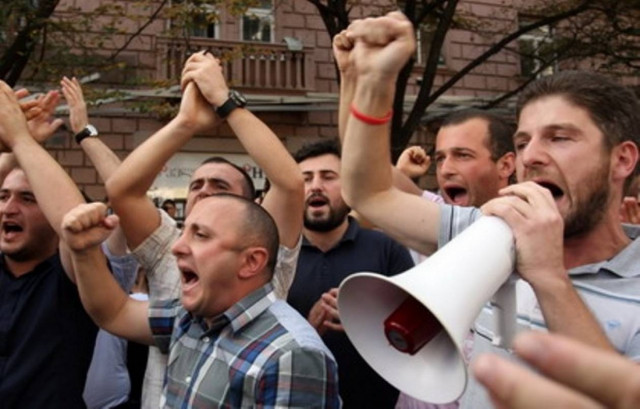 Μαζική διαδήλωση κατά της σκληρής λιτότητας στη Βρετανία