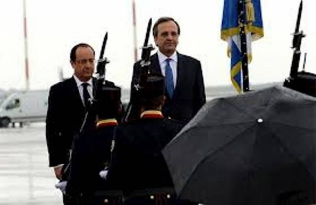 Reuters: Η Ελλάδα υποδέχτηκε τον Ολάντ καλύτερα από τη Μέρκελ