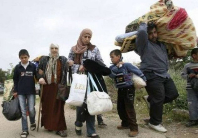 Εγκαταλείπουν τις συνοικίες τους φοβούμενοι νέα σφαγή