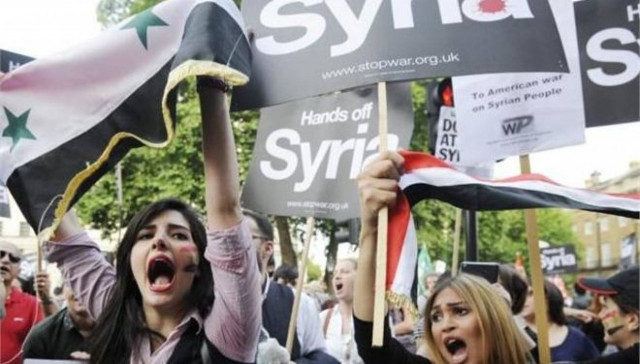 Βρετανία: Διαδηλώσεις εναντίον της ανάληψης στρατιωτικής δράσης