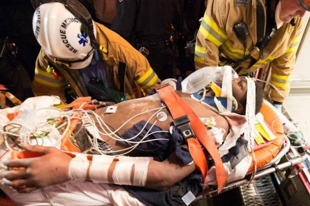 Απίστευτο: Φοιτητής σφήνωσε ανάμεσα σε... δυο κτίρια! (pics)