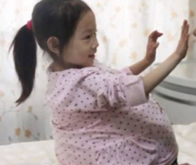 4 year old girl seems like pregnant