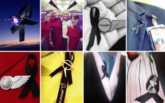 Mαύρες κορδέλες φοράνε αεροσυνοδοί σε όλο τον κόσμο (pics)