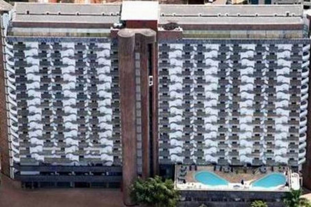 Έζωσε όμηρο με εκρηκτικά απαιτώντας την παραίτηση της Ρούσεφ! (pic)