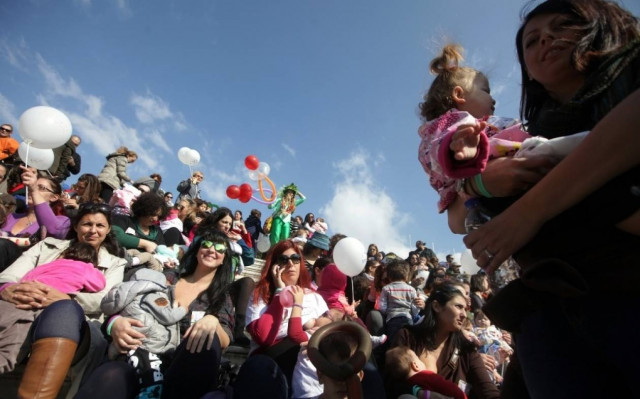 Mothers all around Greece publicly breastfeed their children