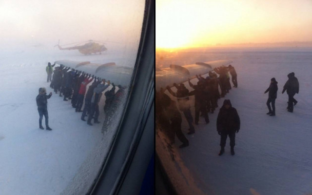 Επιβάτες σπρώχνουν... αεροπλάνο (video)