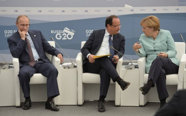 Συμφώνησαν να τα… ξαναπούν για την ουκρανική κρίση Πούτιν, Μέρκελ και Ολάντ