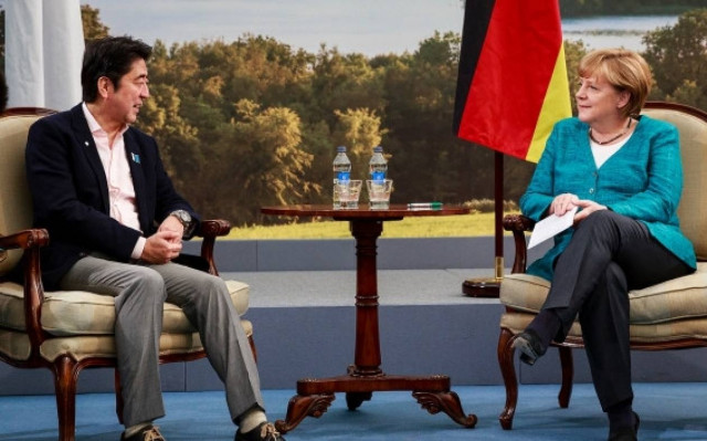 A. Μέρκελ: Προτρέπει την Ιαπωνία να αντιμετωπίσει το μιλιταριστικό της παρελθόν