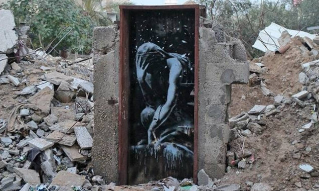 Γάζα: Πούλησε… τσάμπα ανεκτίμητης αξίας έργο του Μπάνκσι σε βομβαρδισμένη πόρτα!