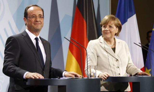 Μερκελ-Ολάντ: Θέλουμε την Ελλάδα στο ευρώ