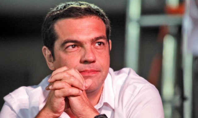 Δημοψήφισμα 2015-Με χαμόγελο και με άσπρο πουκάμισο ψηφίζει ο Τσίπρας