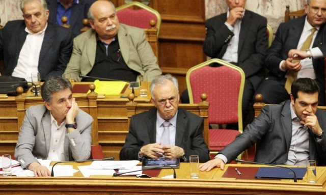 Τι γράφει ο διεθνής Τύπος για την ψήφιση των προαπαιτούμενων από την ελληνική Βουλή