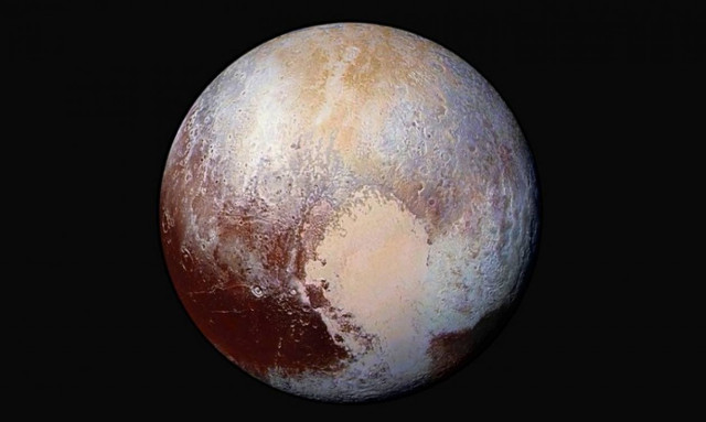 Pluto's flowing ice and mysterious red haze highlight 'a scientific wonderland'