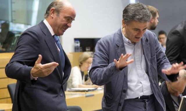 Σε εξέλιξη συνάντηση Τσακαλώτου με τον Μοσκοβισί