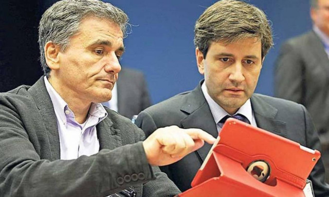 Σε εξέλιξη η συνάντηση Τσακαλώτου - Χουλιαράκη με εκπροσώπους των θεσμών