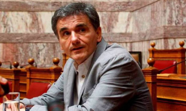 Κίνητρα για τις ηλεκτρονικές συναλλαγές υποσχέθηκε ο Τσακαλώτος