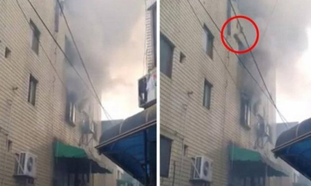 Βίντεο σοκ: Μητέρα πηδάει με τα παιδιά της από τον τέταρτο όροφο φλεγόμενου κτηρίου