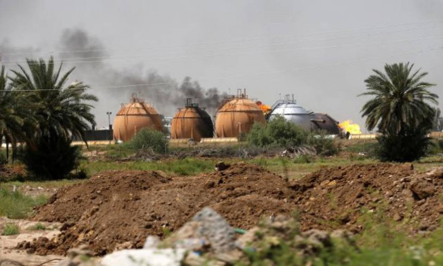 IS attacks at factory north of Baghdad kill 11