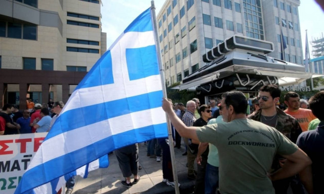 Έξω από το Χρηματιστήριο διαμαρτύρονται οι λιμενεργάτες