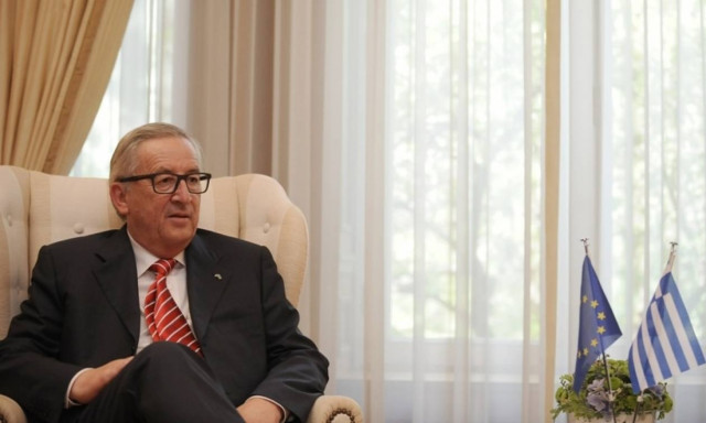 Greece is on the right track, Juncker says