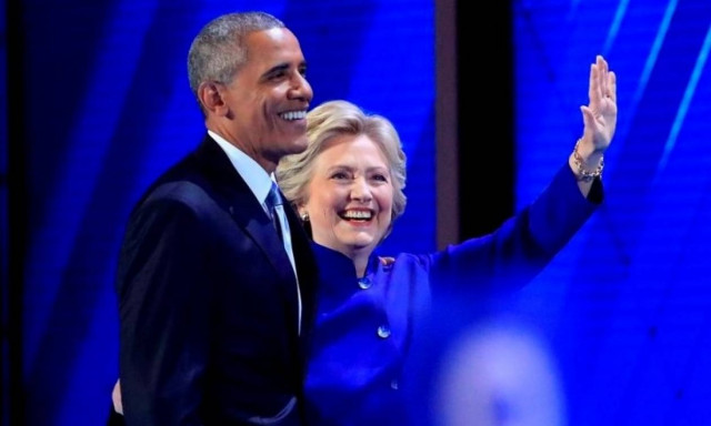 Obama urges Americans to get behind Clinton, slams Trump