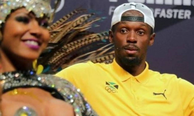 «Καρφώθηκε» στο στήθος καυτής χορεύτριας ο Μπολτ! (photos+videos)