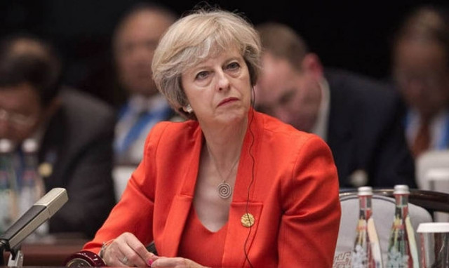 Τερέζα Μέι: Να γίνει η Βρετανία παγκόσμιος ηγέτης στο ελεύθερο εμπόριο