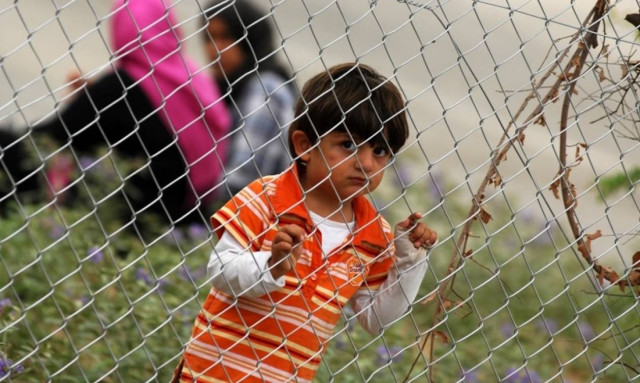 More than 60,000 refugees and migrants in Greece