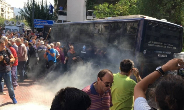 Greek police fire teargas at pensioners during Athens protest