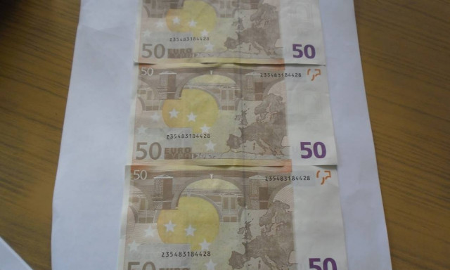 Χειροπέδες σε 23χρονο που έκανε ψώνια με πλαστά 50ευρα!