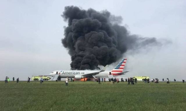 American Airlines jet catches fire on takeoff at Chicago airport
