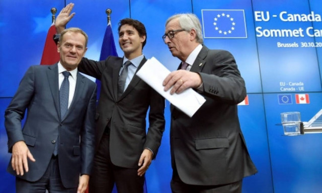 «Ικανοποίηση» για την υπογραφή της Συμφωνίας Ελεύθερου Εμπορίου με τον Καναδά