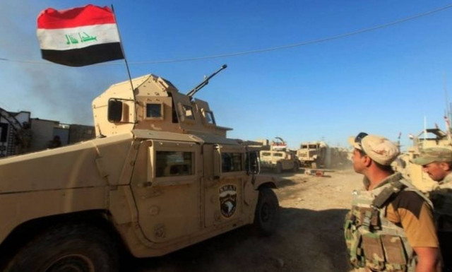 Mosul battle: Iraqi army fights its way into Saddam suburb