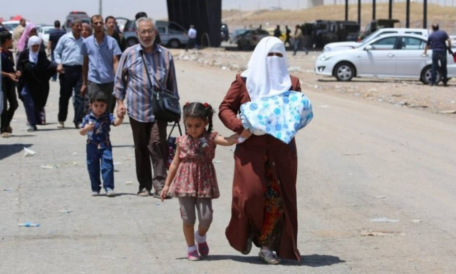 Islamic State abducts more than 200 near Mosul, retreats with thousands: U.N.