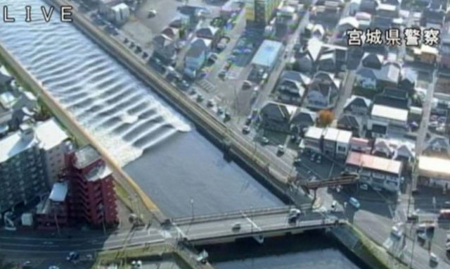 Tsunami hits Japan after strong quake near Fukushima disaster site