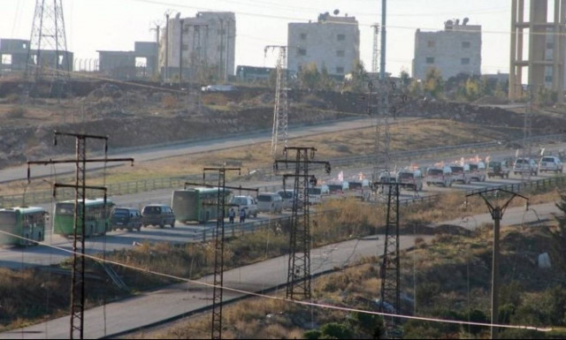 Buses evacuate thousands of exhausted Aleppo residents in ceasefire deal