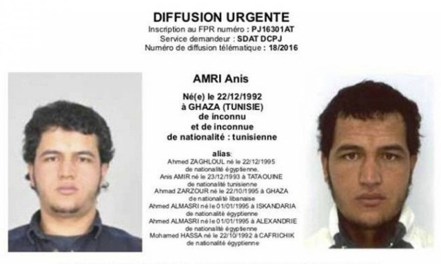 Germany police hunt Tunisian asylum-seeker over Christmas market attack