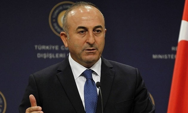 Κυπριακό: «Αρπάχτηκαν» Γιουνκέρ – Τσαβούσογλου