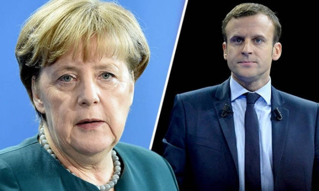 Η Μέρκελ συζητά το ενδεχόμενο να συναντηθεί με τον Μακρόν πριν από τις γαλλικές προεδρικές εκλογές