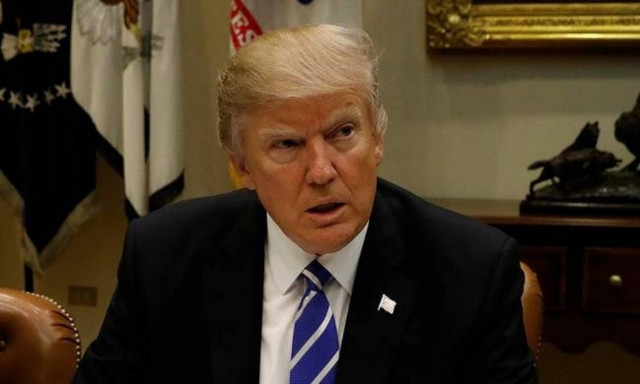 Trump accuses Obama of tapping his phone