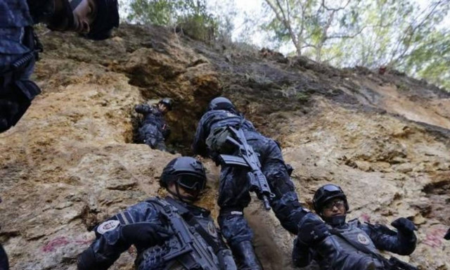 At least 242 bodies found in hidden graves in Mexico