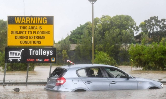 Thousands told to evacuate Australian town after cyclone brings flood fears