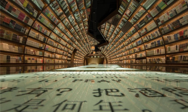 Tούνελ από βιβλία οδηγεί στο πιο εντυπωσιακό βιβλιοπωλείο του κόσμου (pics)