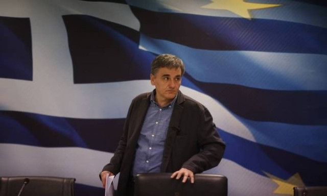 Tsakalotos: Overall deal on Greece's loan tranche, debt feasible within three weeks