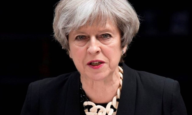 In shadow of deadly attacks, British election campaign resumes